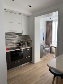 An apartment with a high-end, designer renovation. Move right in!