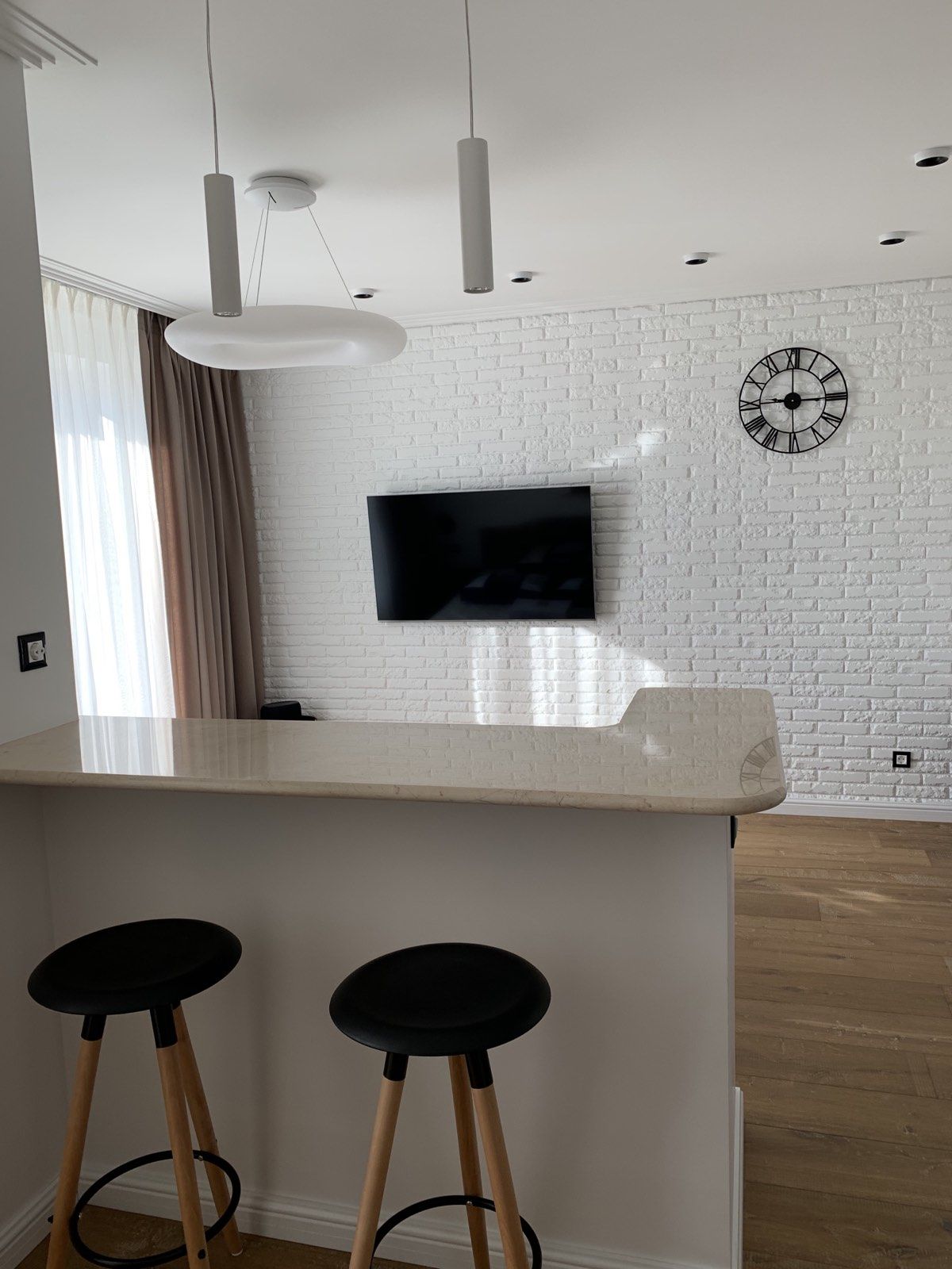 An apartment with a high-end, designer renovation. Move right in!