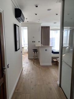 An apartment with a high-end, designer renovation. Move right in!