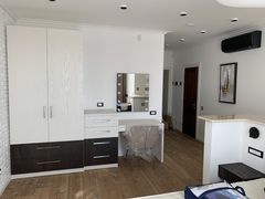 An apartment with a high-end, designer renovation. Move right in!