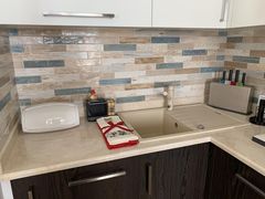 An apartment with a high-end, designer renovation. Move right in!