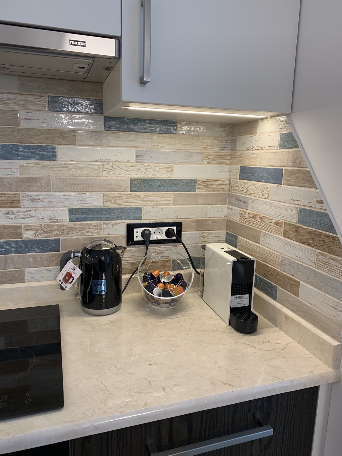 An apartment with a high-end, designer renovation. Move right in!