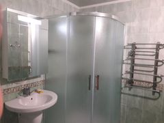 Two-bedroom apartment for sale with a large open-concept kitchen and recent renovations in a brick building