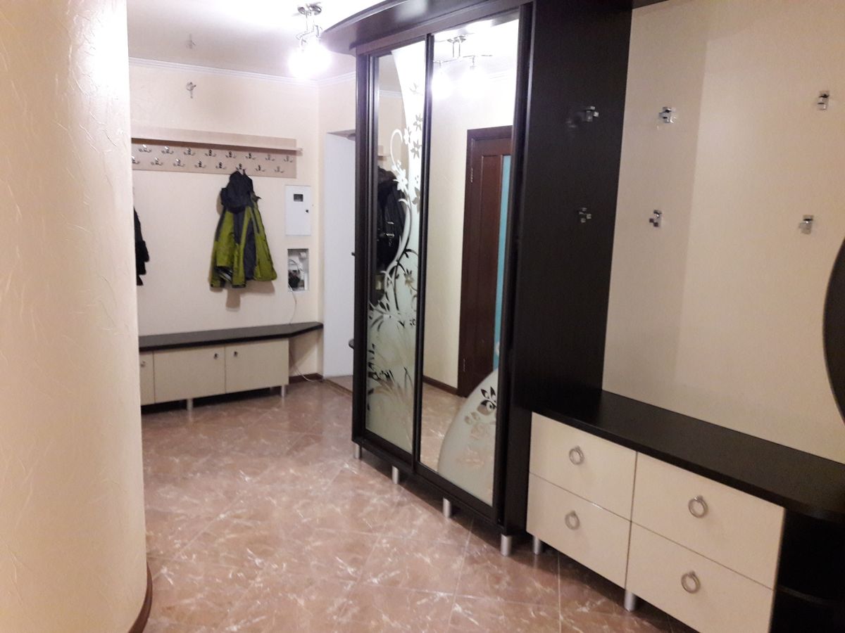 Two-bedroom apartment for sale with a large open-concept kitchen and recent renovations in a brick building
