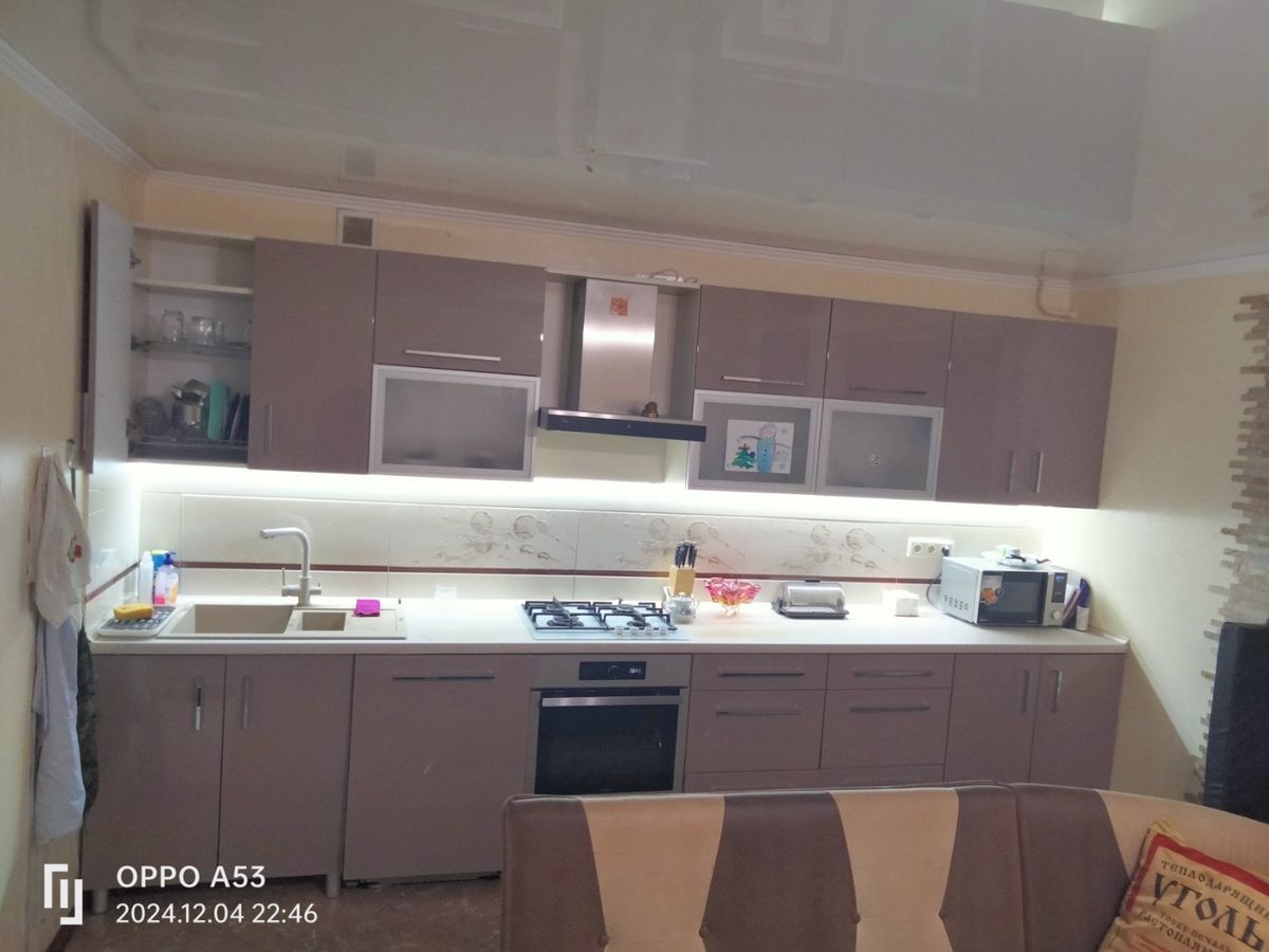 Two-bedroom apartment for sale with a large open-concept kitchen and recent renovations in a brick building