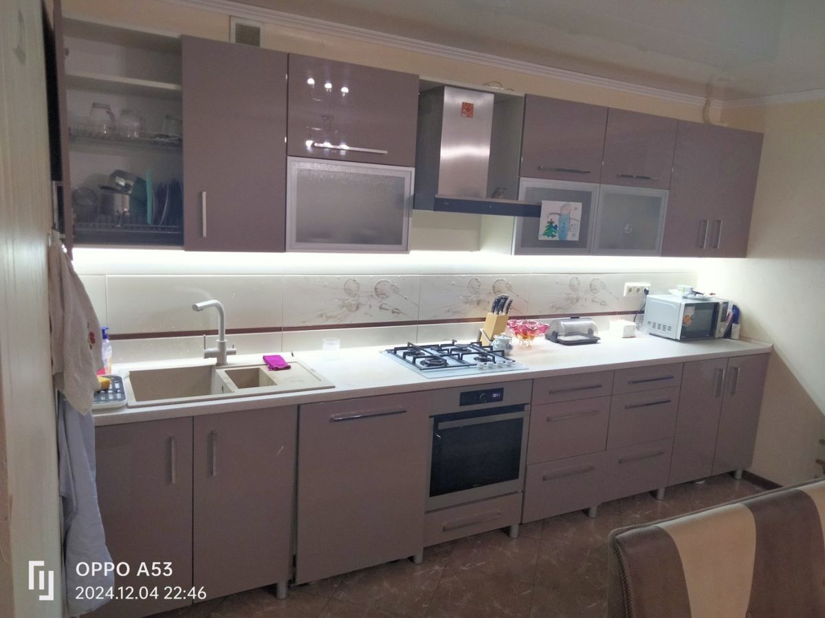 Two-bedroom apartment for sale with a large open-concept kitchen and recent renovations in a brick building