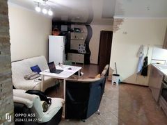 Two-bedroom apartment for sale with a large open-concept kitchen and recent renovations in a brick building