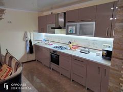 Two-bedroom apartment for sale with a large open-concept kitchen and recent renovations in a brick building